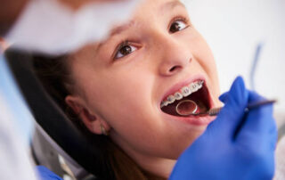 When to See an Orthodontist: Signs & Timing